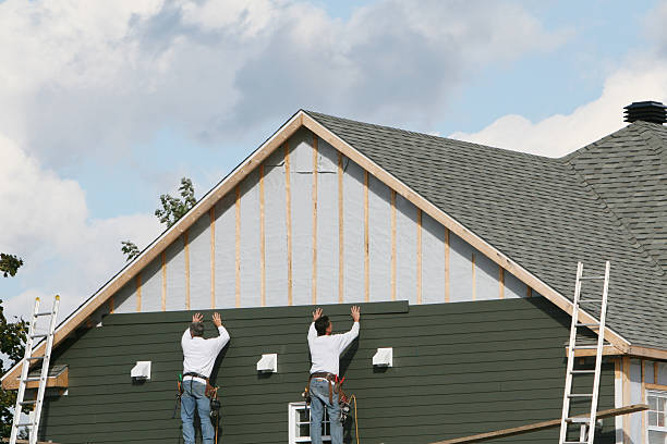 Professional Emergency Siding Repair technician working in New Smyrna Beach, FL